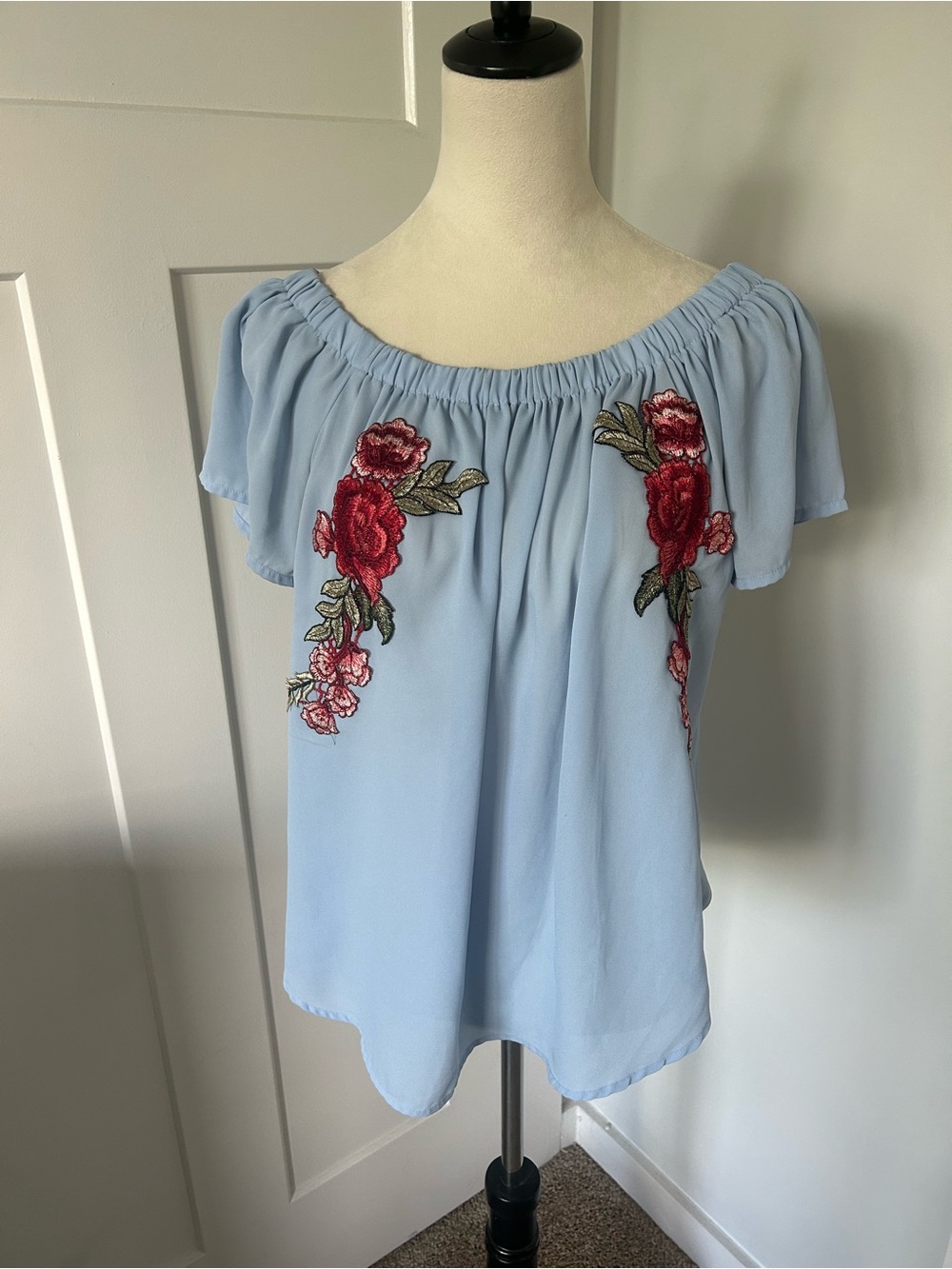 Live 4 Truth Light Blue Off-Shoulder Top with Red Floral Embroidery